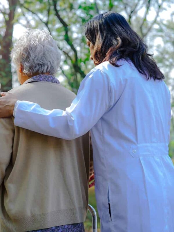 Help and care Asian senior or elderly old lady woman use walker